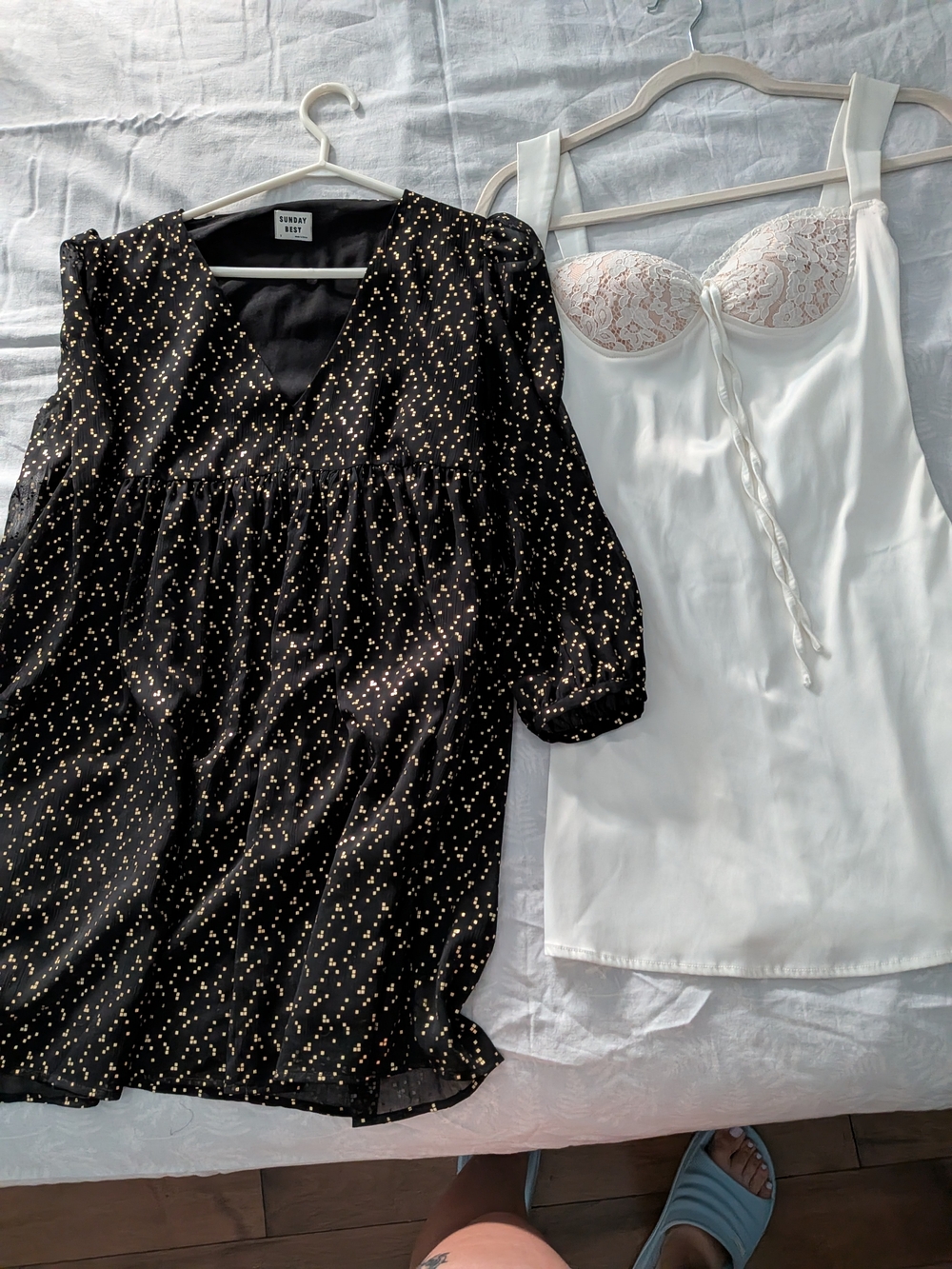 Aritzia Black Mini Dress and white bustier mini dress.